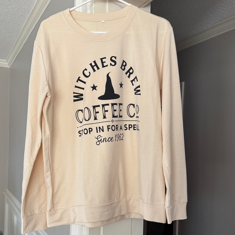 Amazon Cream Sweatshirt with Black Print